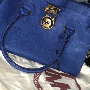 Blue Michael Kors Handbag. Garmet bag included!